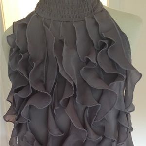 Tuxedo silk top. Runs more like a size 8